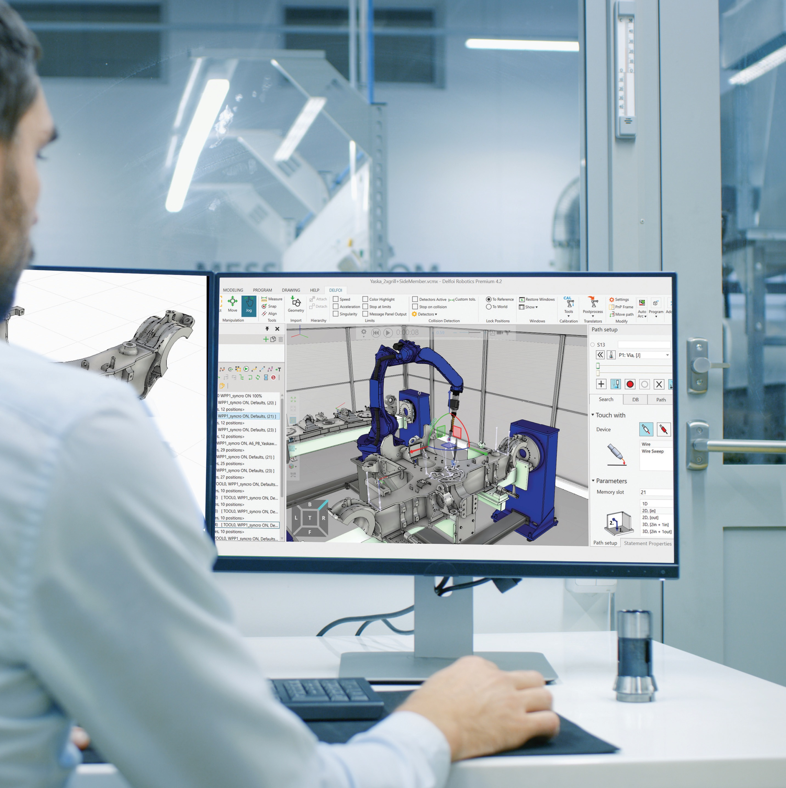 Einfache simulationsbasierte Offline-Programmierung von Roboterzellen mit DUALIS